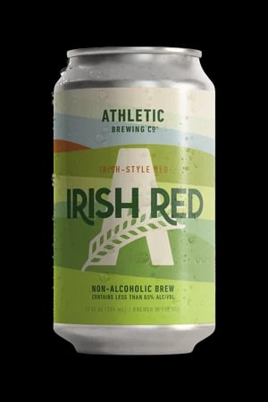 Athletic Brewing Irish Red alcohol-free beer showcasing amber-red hue with caramel and dark stone fruit flavors balanced by subtle bitterness