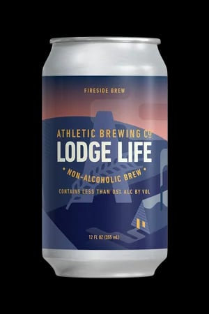Lodge Life non-alcoholic beer by Athletic Brewing featuring stout-inspired campfire flavors with cinnamon, vanilla, and cacao nibs