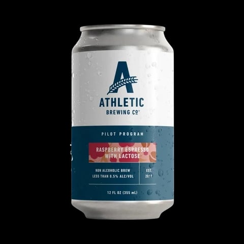 Raspberry Espresso beer, a non-alcoholic brew with vibrant packaging, featuring a dark background and highlighting the product's unique flavor profile.