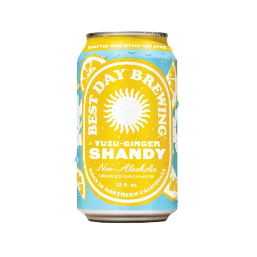 Best Day Brewing Yuzu Ginger Shandy, a refreshing non-alcoholic beer featuring yuzu and ginger, on a plain background.