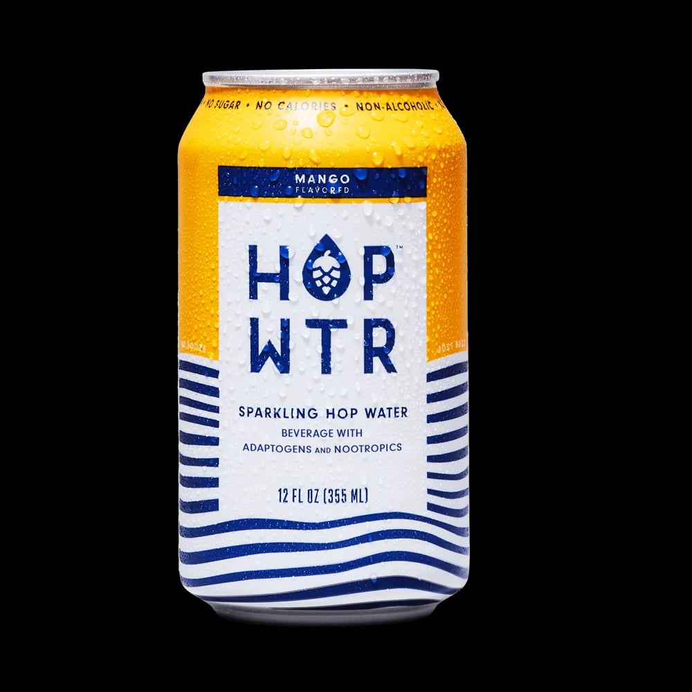 HOP WTR Mango, a refreshing non-alcoholic hop water with vibrant mango flavor and bold hop notes, presented against a plain background.