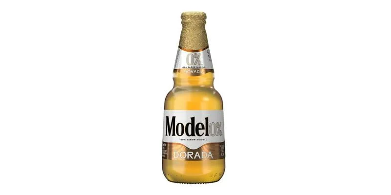 Modelo Cero Dorada Golden non-alcoholic beer with light body, subtle sweetness, and crisp refreshing flavor against plain background