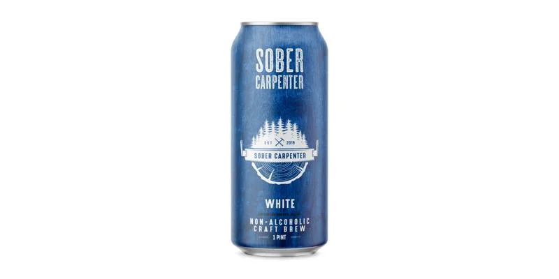 Sober Carpenter White Wheat non-alcoholic beer with balanced aromas of orange, coriander, and wheat in a rich hazy body