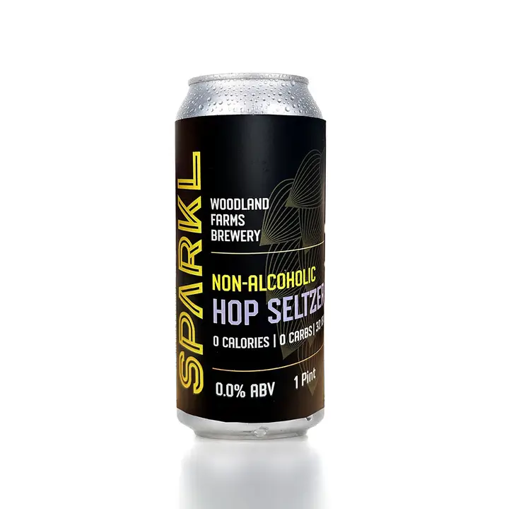 Woodland Farms Brewery Sparkl non-alcoholic beer featuring bright hop-forward citra flavor with a subtle lemon finish in a sleek package